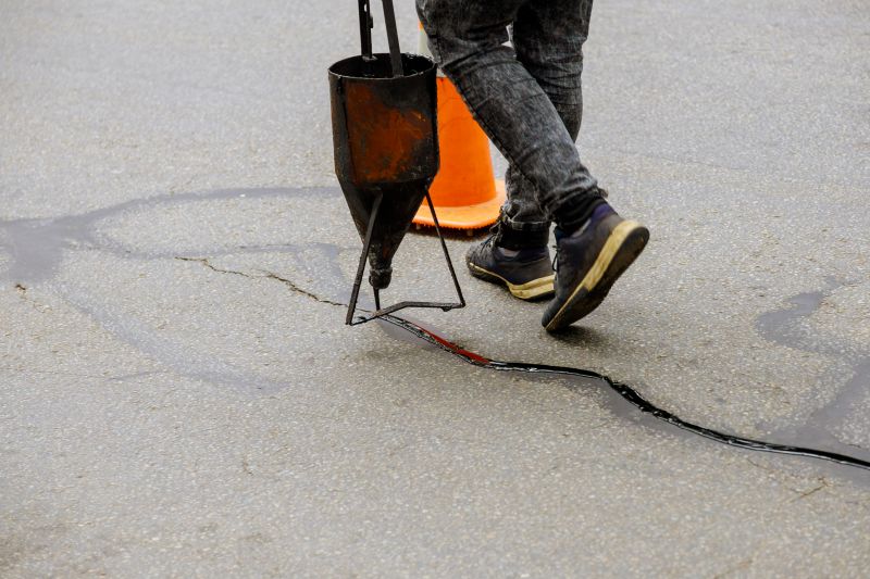 Local Cracked Asphalt Repair pros at work